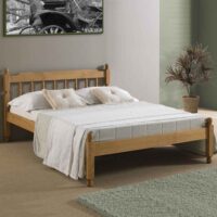 Coleton Spindle Wooden Single Bed In Waxed Pine
